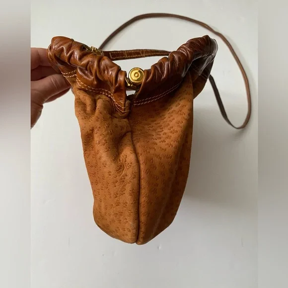 Furla Suede Vintage Brown Crossbody Gold Hardware looks like tiny cat paw prints
